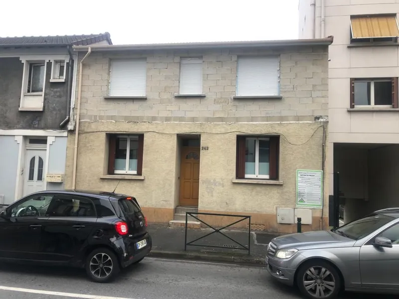 Façade de maison ancienne rénovée à Corbeil-Essonnes